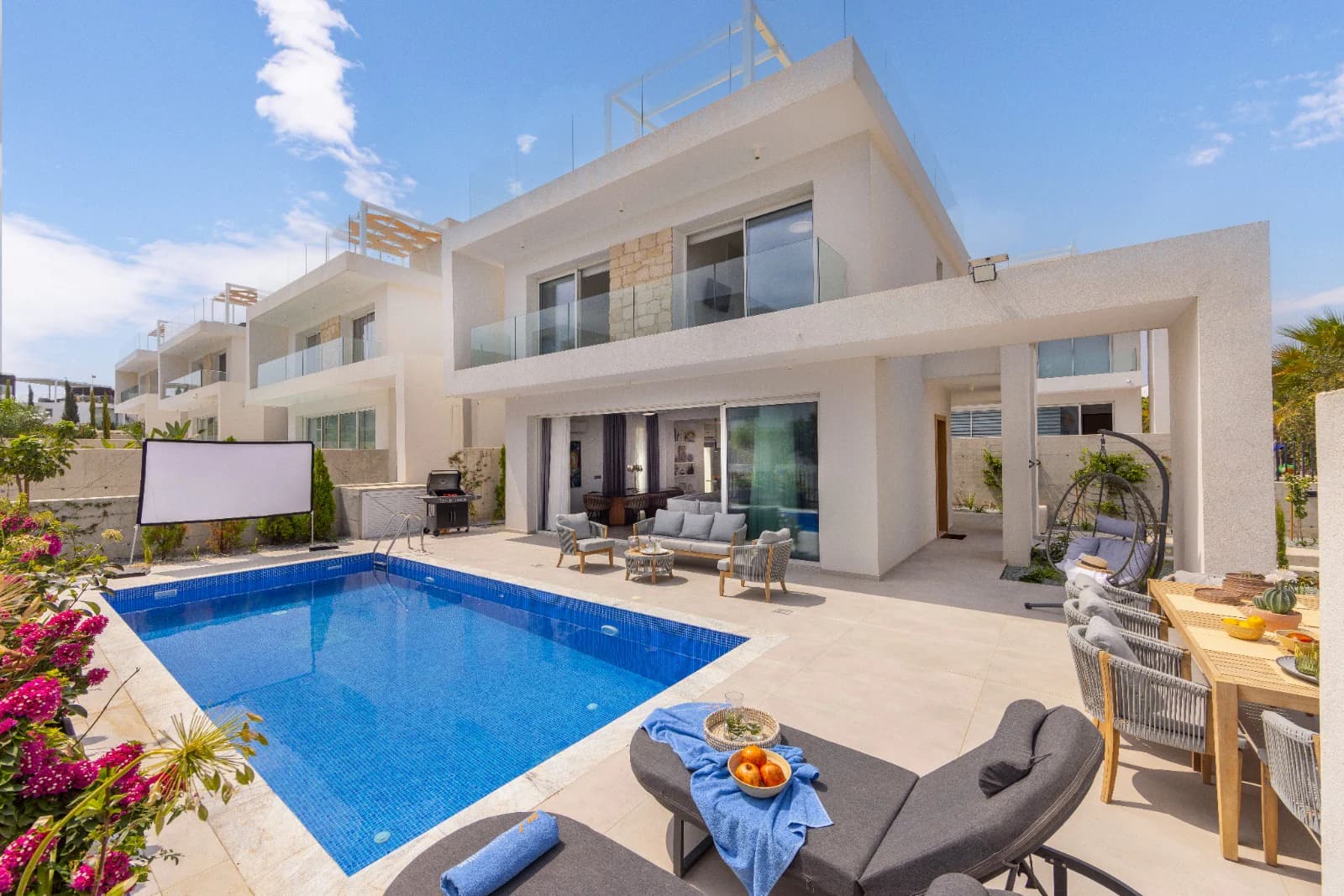 The villa seen in full from across the pool.
